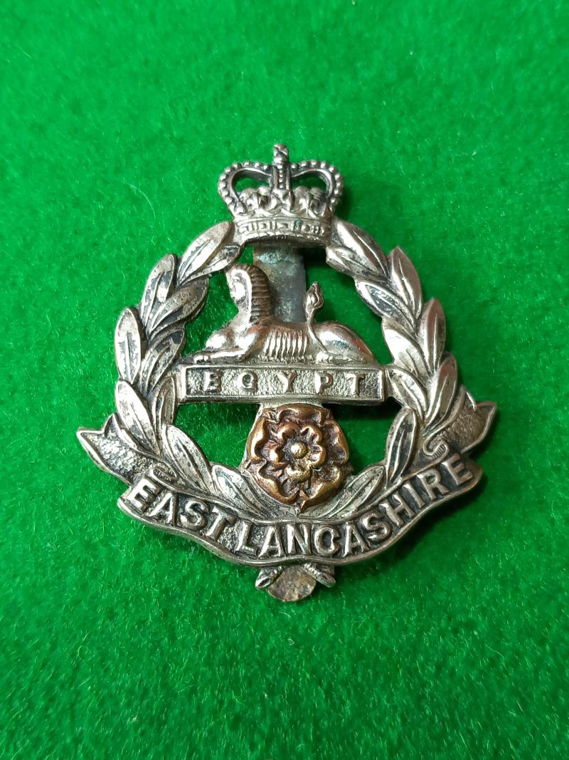EAST LANCASHIRE  QUEENS CROWN METAL BADGE